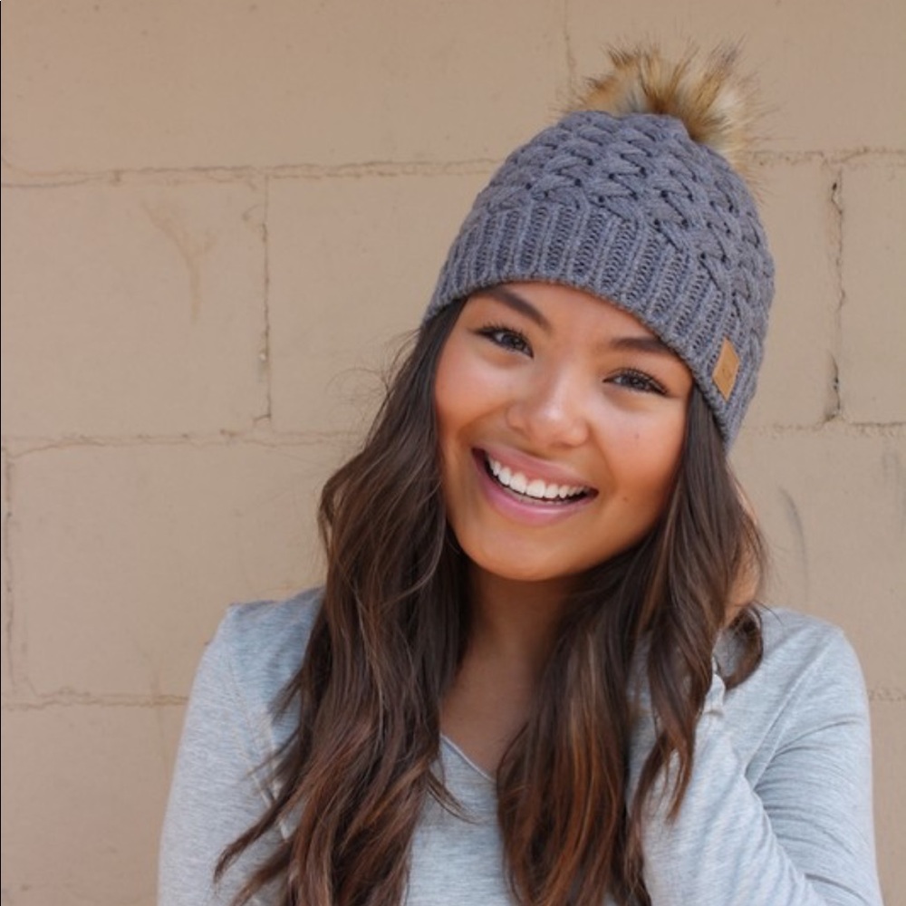 Fleece lined knit hat with Pom accent